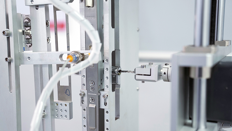 HOPO laboratory equipment testing a window hardware component